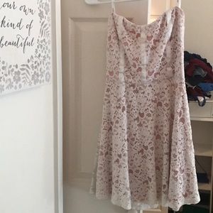 Pink and white lace strapless dress.